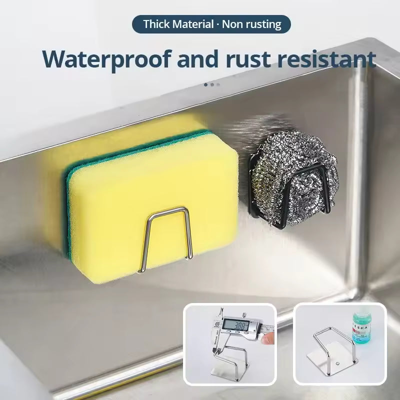 Adhesive stainless steel sponge holder mounted beside a sink