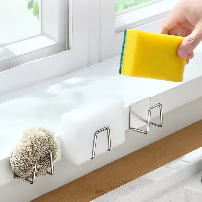 Adhesive stainless steel sponge holder mounted beside a sink – view 3