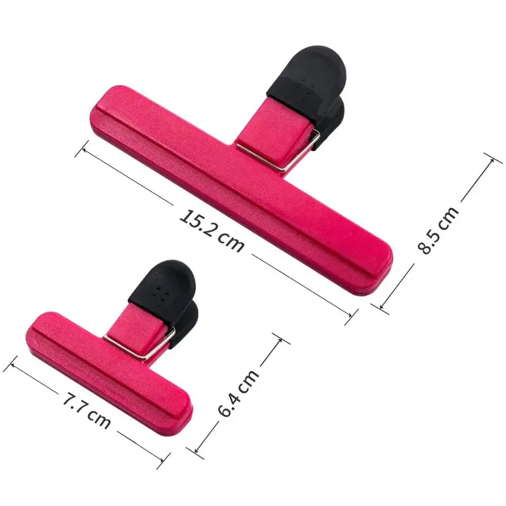 Three reusable small bag sealing clips in assorted colors – view 5