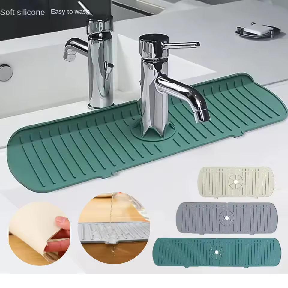 Gray 13-inch silicone faucet splash mat placed behind a compatible sink faucet