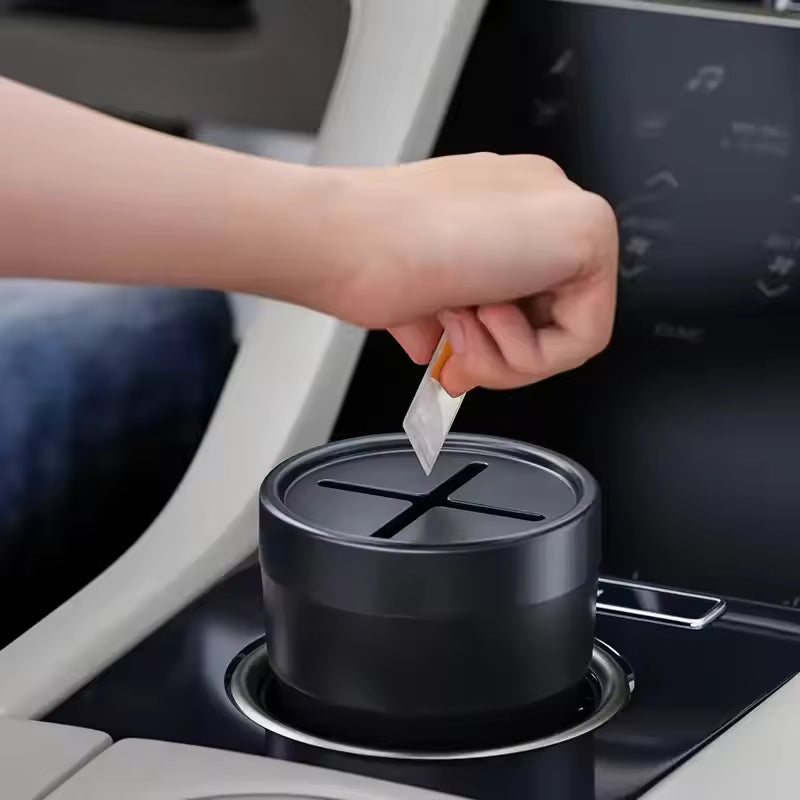 Compact lidded trash bin for storing small waste in a car